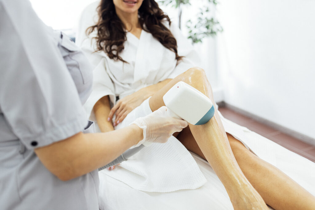 Hair Removal Procedure. Cropped Shot Of Young Fit Brunette Woman