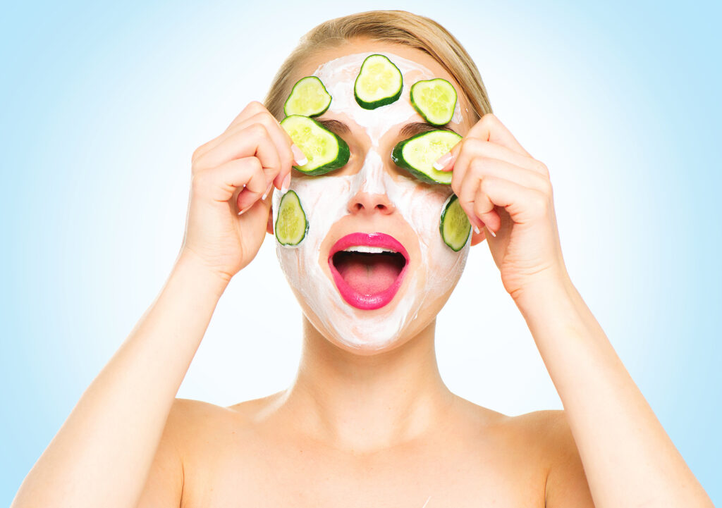 million dollar facial course - Woman applying fresh Facial Mask